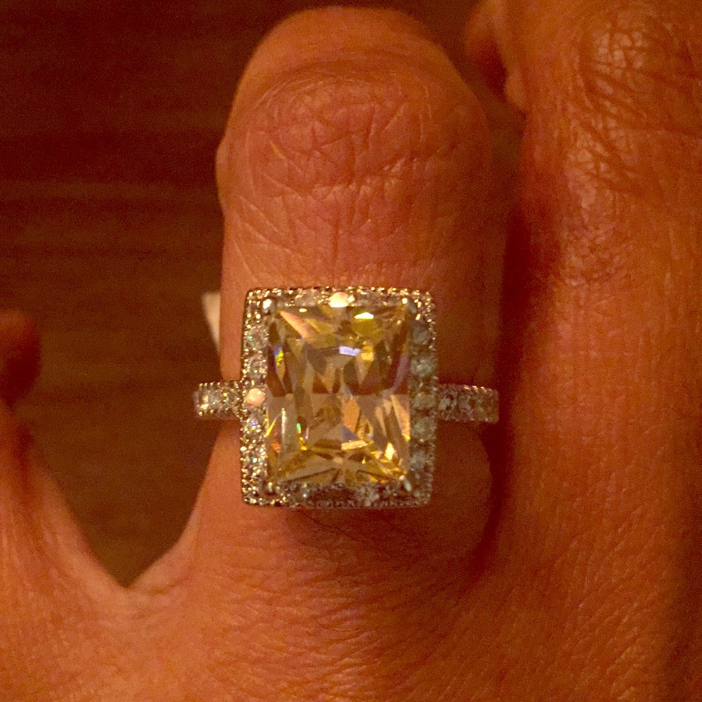 Women’s pink princess cut ring